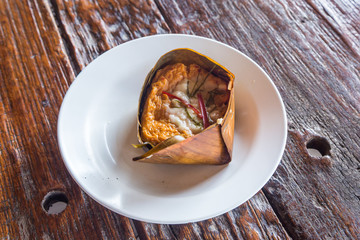 Steamed fish with curry paste : Traditional thai food.