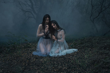 Creepy lady with long black hair looking at you