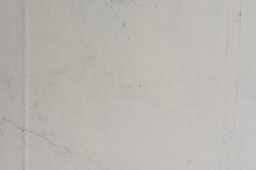 Wall fragment with scratches and cracks