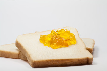 slice toast  and marmalade jam 
slice toast  and marmalade jam on a white background