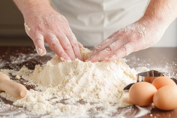 man hands kneading a dough