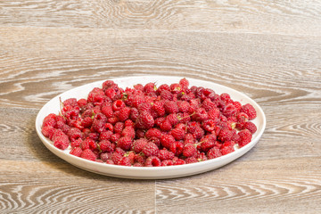 Raspberry on a wooden table