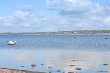 rowing boat at the shore of baltic sea