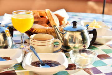 Moroccan breakfast served on hotel terace in Atlas Mountains
