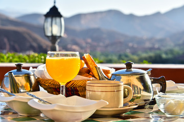 Moroccan breakfast served on hotel terace in Atlas Mountains