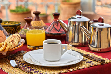 Moroccan breakfast served on hotel terace in Atlas Mountains
