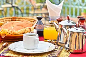 Moroccan breakfast served on hotel terace in Atlas Mountains