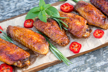 Baked spicy chicken wings in the Asian style