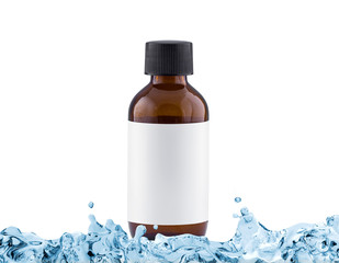 Brown cosmetic bottle with blank label in water splash, moisturi