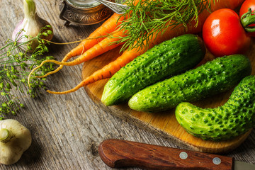 Vegetables and knife on table