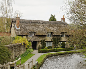 18th Century thatched roof cottage in North Yorkshire, England - 123257129