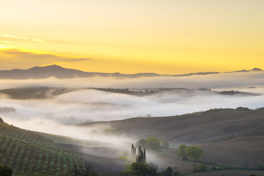 Beautiful, misty morning in the Tuscan valley val d'Orcia
