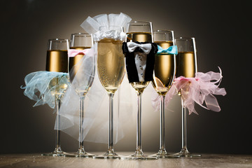 Composition of stylized glasses with champagne for wedding party