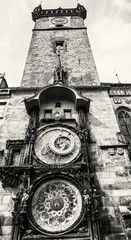 Naklejka premium Old town hall with astronomical clock in Prague, black and white
