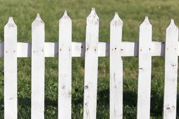 Fototapeta premium white wooden fence on nature