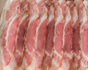 Sliced smoked bacon.