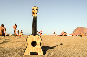 Guitar on the Sand Beach