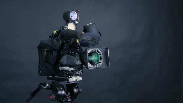 Broadcast camera isolated on a background. No people. 4K.