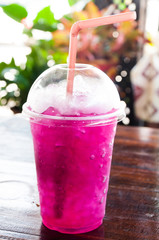Crake lemon juice in glass on nature background
