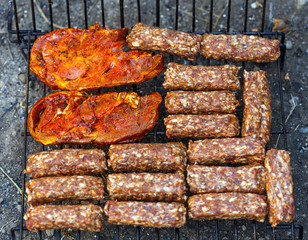 Minced meat rolls on bbq