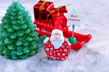 Christmas background. Santa Claus, Christmas tree and gifts.