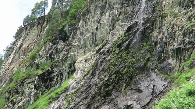Zillertal valley landscape with waterfalls and wild streams on rocks. Located at Schoenachtal valley in Tirol (Austria).