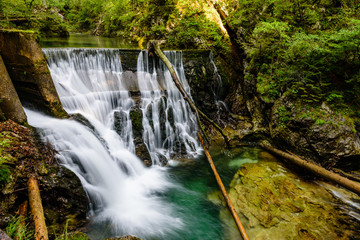 Waterfall at the Vintgar gorge, beauty of nature, with river Radovna flowing through, near Bled, Slovenia.