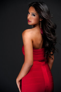 brunette in red dress