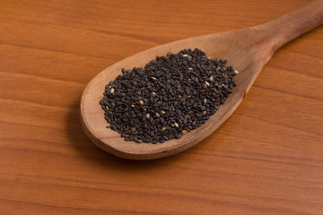 Black Sesame into a spoon