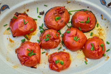 grilled tomato halves cut in the plate