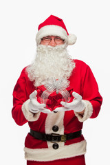 Santa Claus: Cheerful With Small Stack Of Gifts