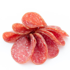 Salami smoked sausages slices isolated on white background.