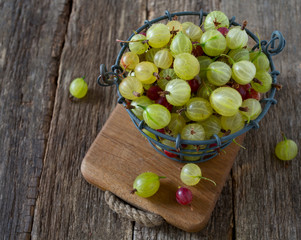 gooseberries on wooden surface