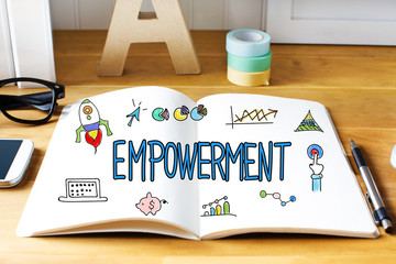 Empowerment concept with notebook