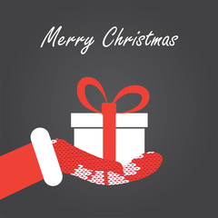 Gift box in Santa's hand