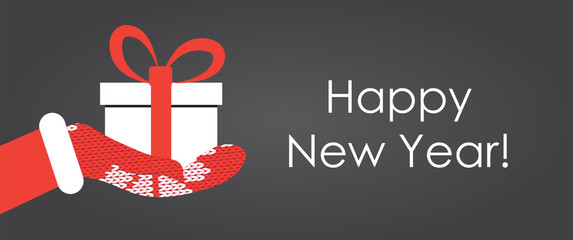 Gift box in Santa's hand