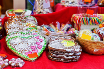 Fototapeta na wymiar Handmade colorful gingerbreads displayed at Riga Christmas market