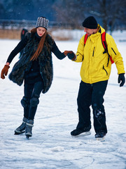 Young girl and fellow ice skating Trakai Lithuania