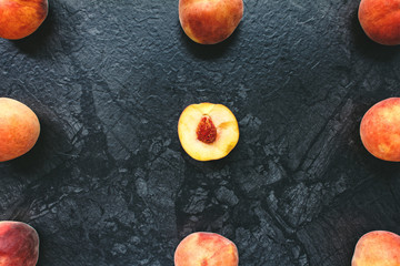 peaches on black background