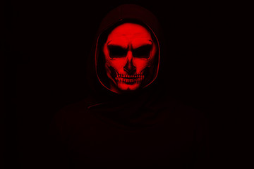 Evil man on black background