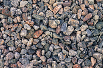 Abstract background with decorative floor pattern of sea gravel stones, Gravel texture