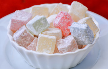 Turkish delight in a plate ,isolated. 