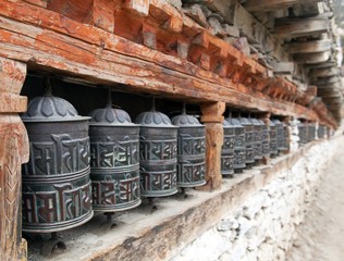 Buddhist many prayer wheels