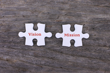 Missing white puzzle with positive Vision Mission and copyspace area