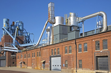 Dubuque Iowa, October 2016: A manufacturing plant in the historic Millwork District of Dubuque, Iowa sits under a blue sky on a warm October day. © geraldmarella