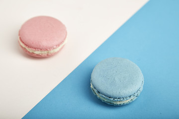 french colorful macarons on colorful background