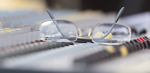 Concert music console with sunglasses © schankz