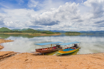 Fototapeta na wymiar Boat at the Kaeng Krachan Dam in Kaeng Krachan National Park Thailand