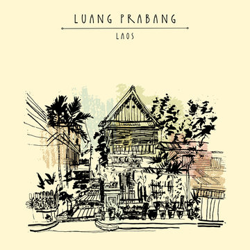 Old traditional wooden house in Lao style. Luang Prabang, Laos, Southeast Asia. Vintage hand drawn touristic postcard