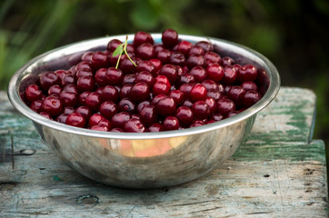 cherries in an iron dish